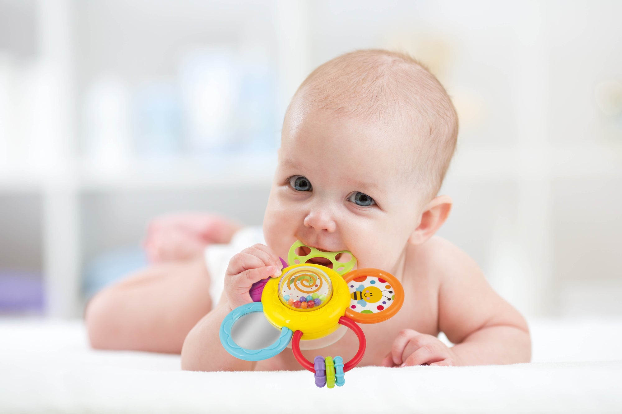 Daisy Spin Rattle 'N Teether